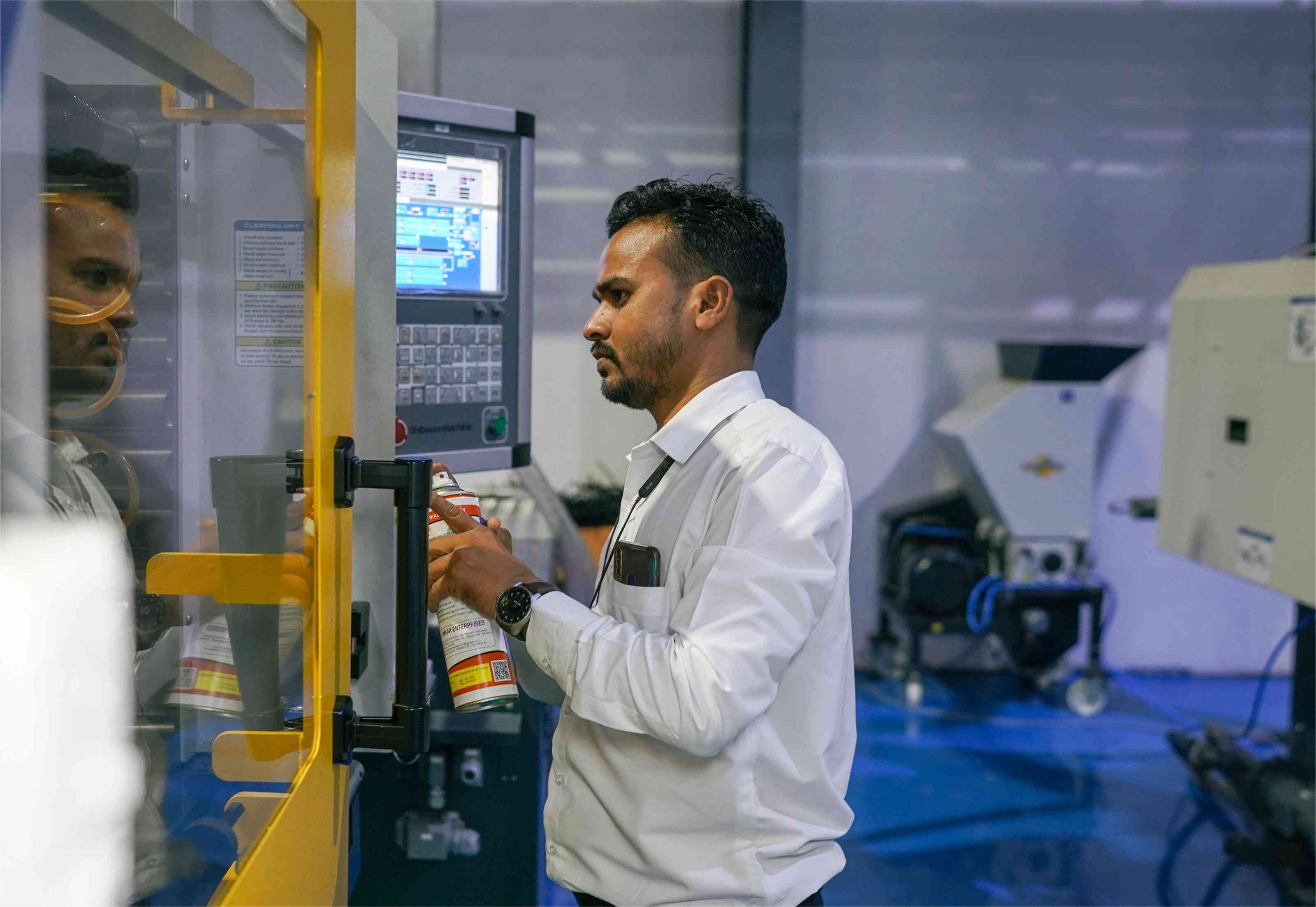 Injection molding production floor at Devaba polymers PVT LTD