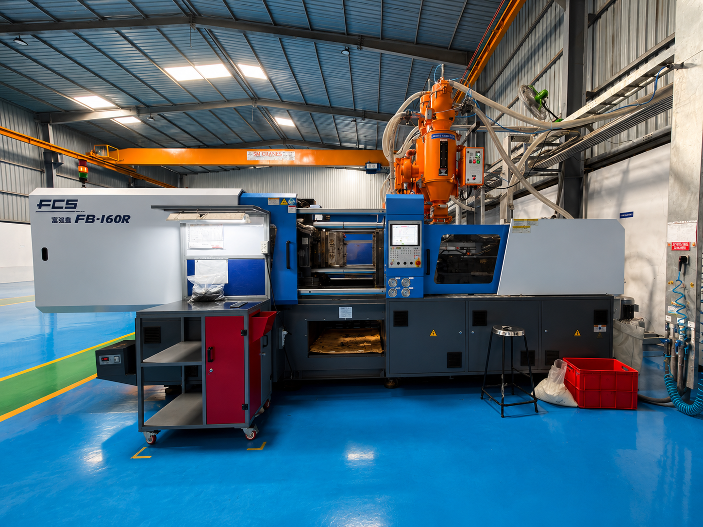 Injection molded automotive plastic components after quality inspection at FD Group