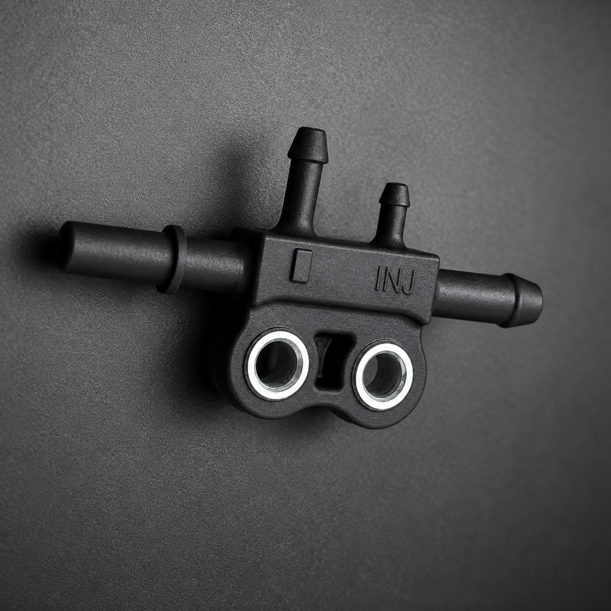 Comparison of insert molded metal-in-plastic part and overmolded soft-grip component